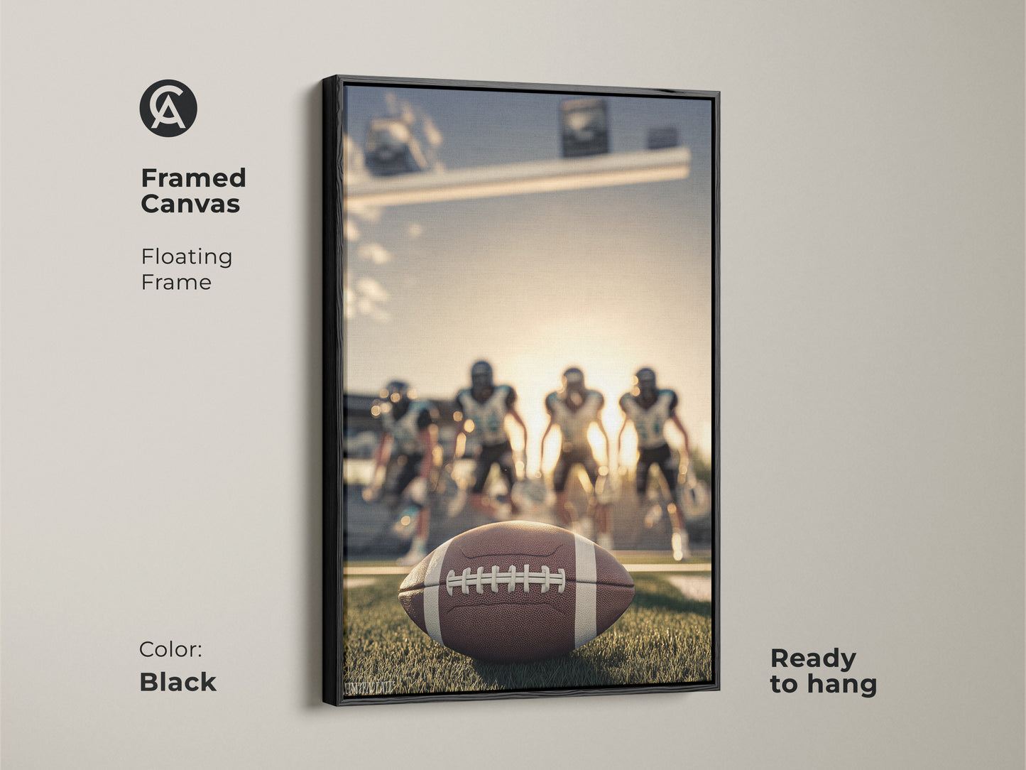 Framed canvas of American Football artwork. The floating frame is black and ready to hang. The art captures the energy of the game. It shows a football on the field with players in action. This sports decor is ideal for masculine home office art.
