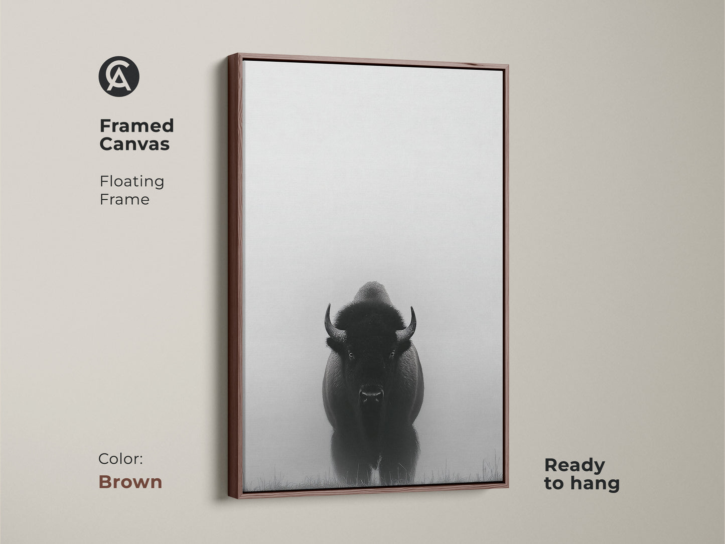 A framed canvas features minimalist bison art in brown. This black and white prairie canvas is ready to hang. The wildlife animal landscape print adds a rustic farmhouse touch to any room.