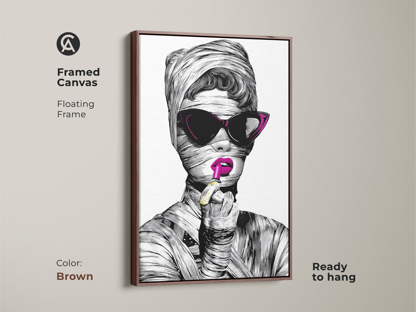 A framed canvas featuring a surreal woman with magenta lipstick. The brown floating frame complements the pop art woman portrait. This unique wall art gift is perfect for fashionista home decor. It's a modern eclectic decor piece ready to hang.