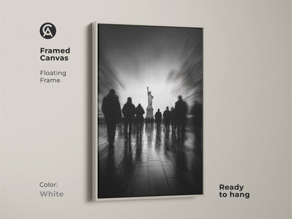 Create a clean modern look with this framed canvas art in white. The Statue of Liberty shines in this captivating monochrome artwork. Blurred figures add a dynamic element to the scene. The floating frame complements any decor. Ready to hang and enjoy.