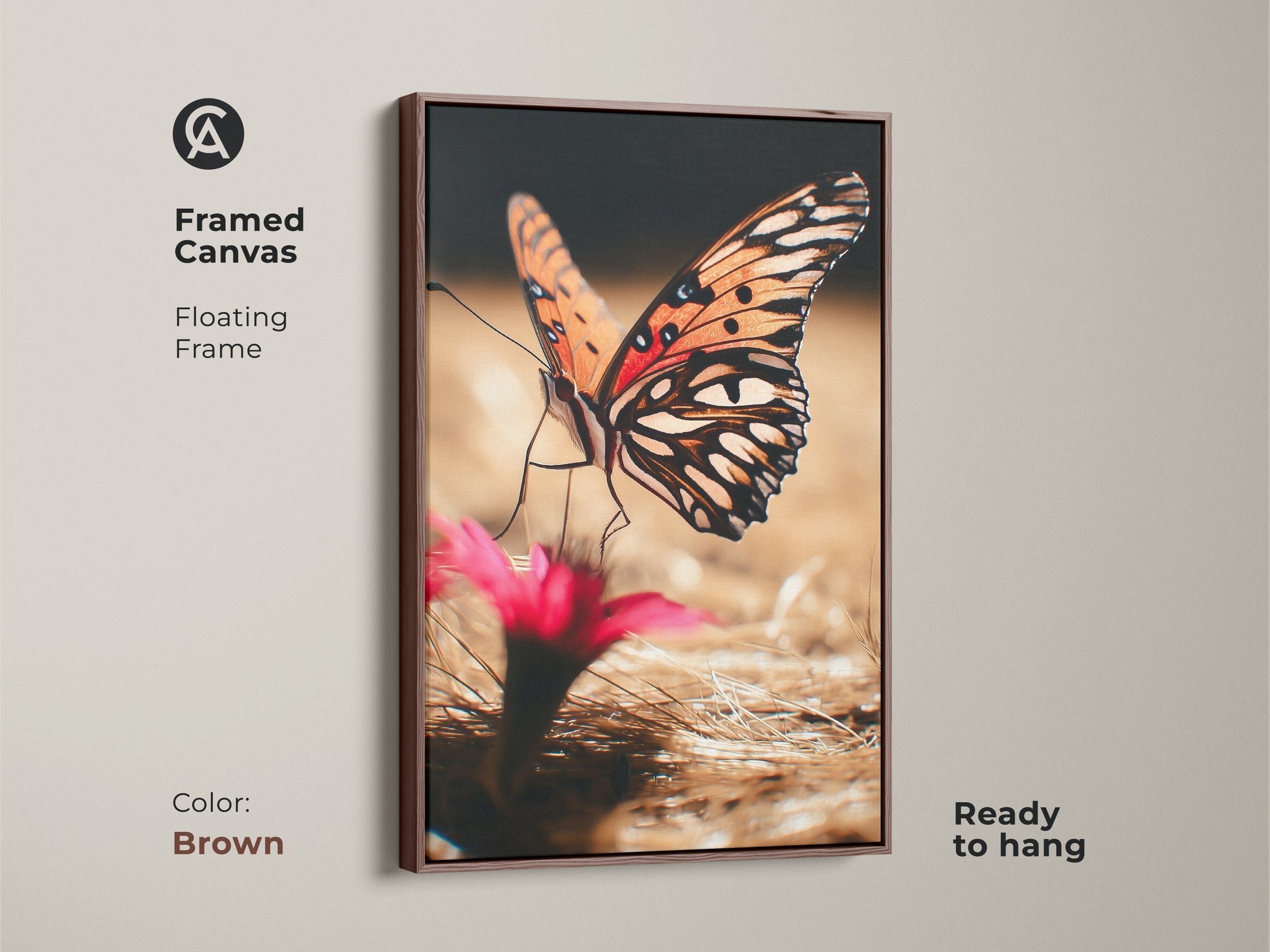 Framed canvas with a floating brown frame features a close-up of an orange butterfly. Ready to hang this nature photography print brings the beauty of the outdoors inside. A realistic insect wall decor choice for boho style homes. Great gift for nature lovers.
