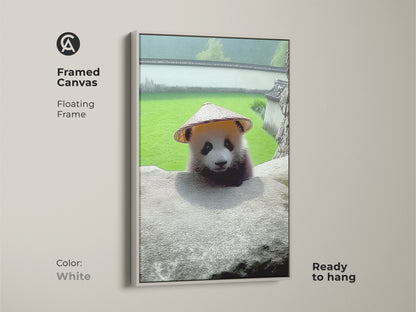 White Framed Canvas of Baby Panda Wall Art. This cute nursery decor print shows a panda with a hat. It is photorealistic animal artwork. A new baby gift idea. Animal nature wall decor.