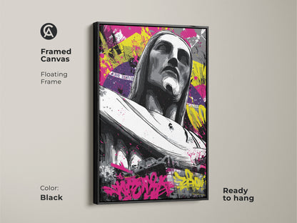 Framed canvas of Christ the Redeemer. The floating frame is black. This artwork features urban graffiti and abstract splatter. A modern religious piece ready to hang. Ideal for office and home decor