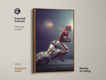 Framed American Football Player Tackled Canvas art with a white floating frame. This sports action wall decor is ready to hang. This man cave wall hanging is a perfect gift for football fans. The red white and blue artwork adds a sporty energetic vibe