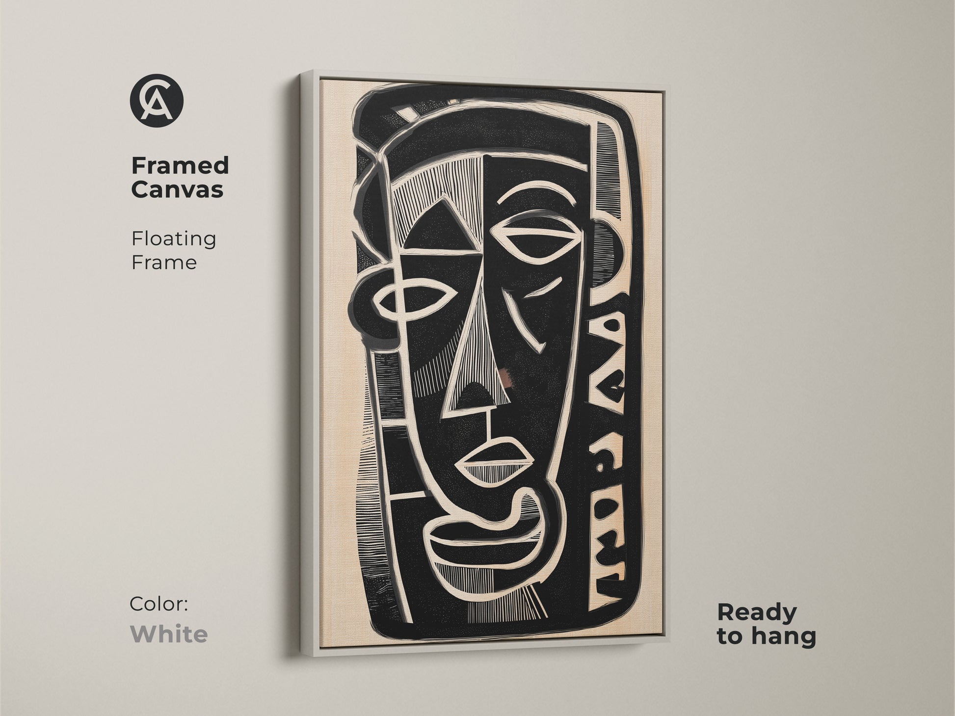 Framed canvas print of a black white and beige abstract face. This floating frame has a white finish and is ready to hang. The modern figurative portrait is an ideal piece for eclectic home decor complementing modern wall art trends.