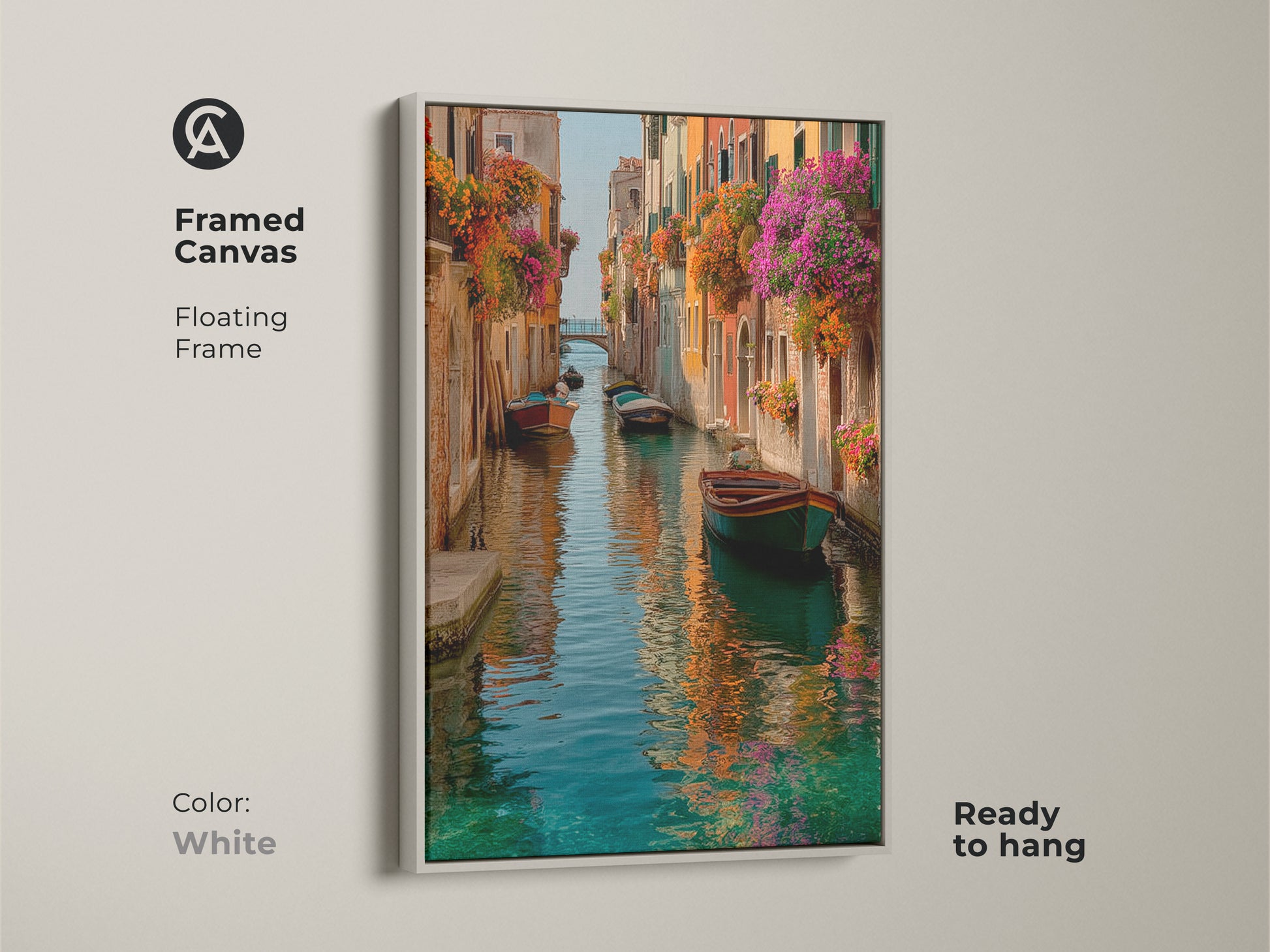 Framed canvas of Venice canal artwork. A floating frame in white enhances this Italian romantic landscape. Ready to hang. The colorful boats and flowers bring vibrant life to any room.