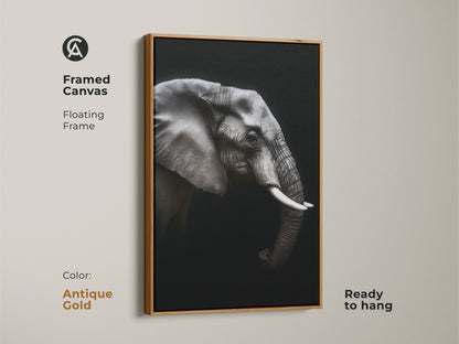 Framed monochrome elephant canvas in an antique gold floating frame. Ready to hang black and white wildlife artwork adds a contemporary touch. Ideal animal portrait canvas for modern office wall art. This elegant animal print is a perfect gift for wildlife enthusiasts.