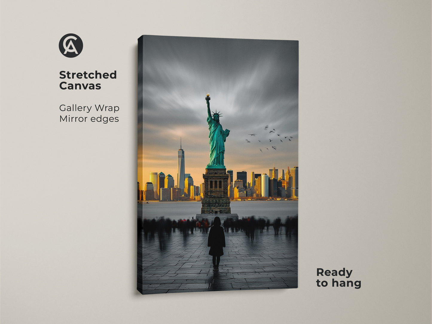 This gallery wrapped canvas art shows the Statue of Liberty and NYC skyline. The canvas has mirror edges and comes ready to hang. The image features a person viewing the statue. Get this stretched canvas to add a touch of New York to any room.