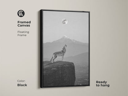 Black framed canvas featuring a wolf howling at the moon. Contemporary animal poster for rustic modern wall art. Ready to hang fine art wolf painting.