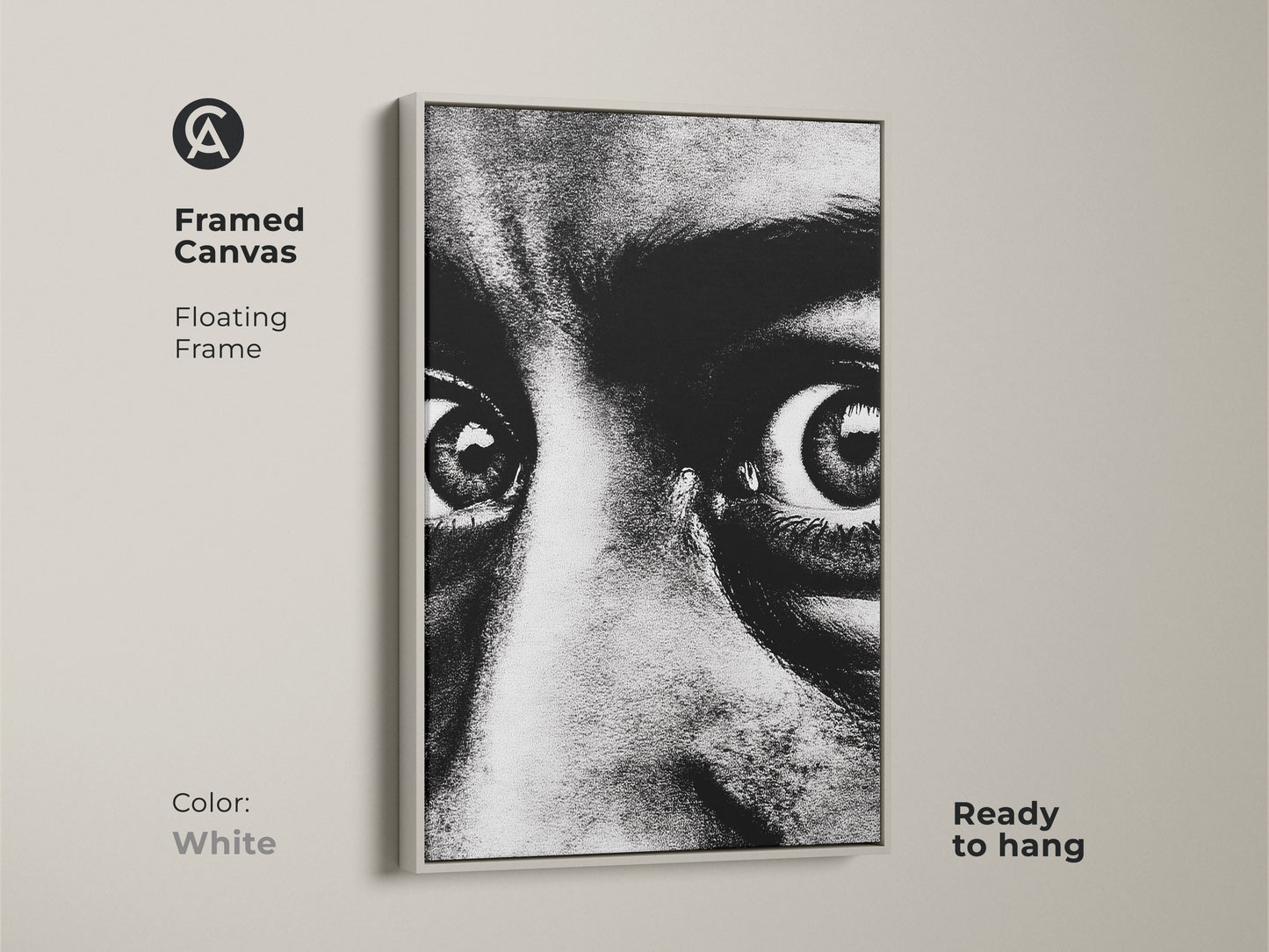 Framed canvas of a monochrome face portrait with a white floating frame. Ready to hang this intense gaze canvas art adds a contemporary touch. The expressive eyes artwork is perfect for modern monochrome decor. Enhance your entryway with this bold black and white print.