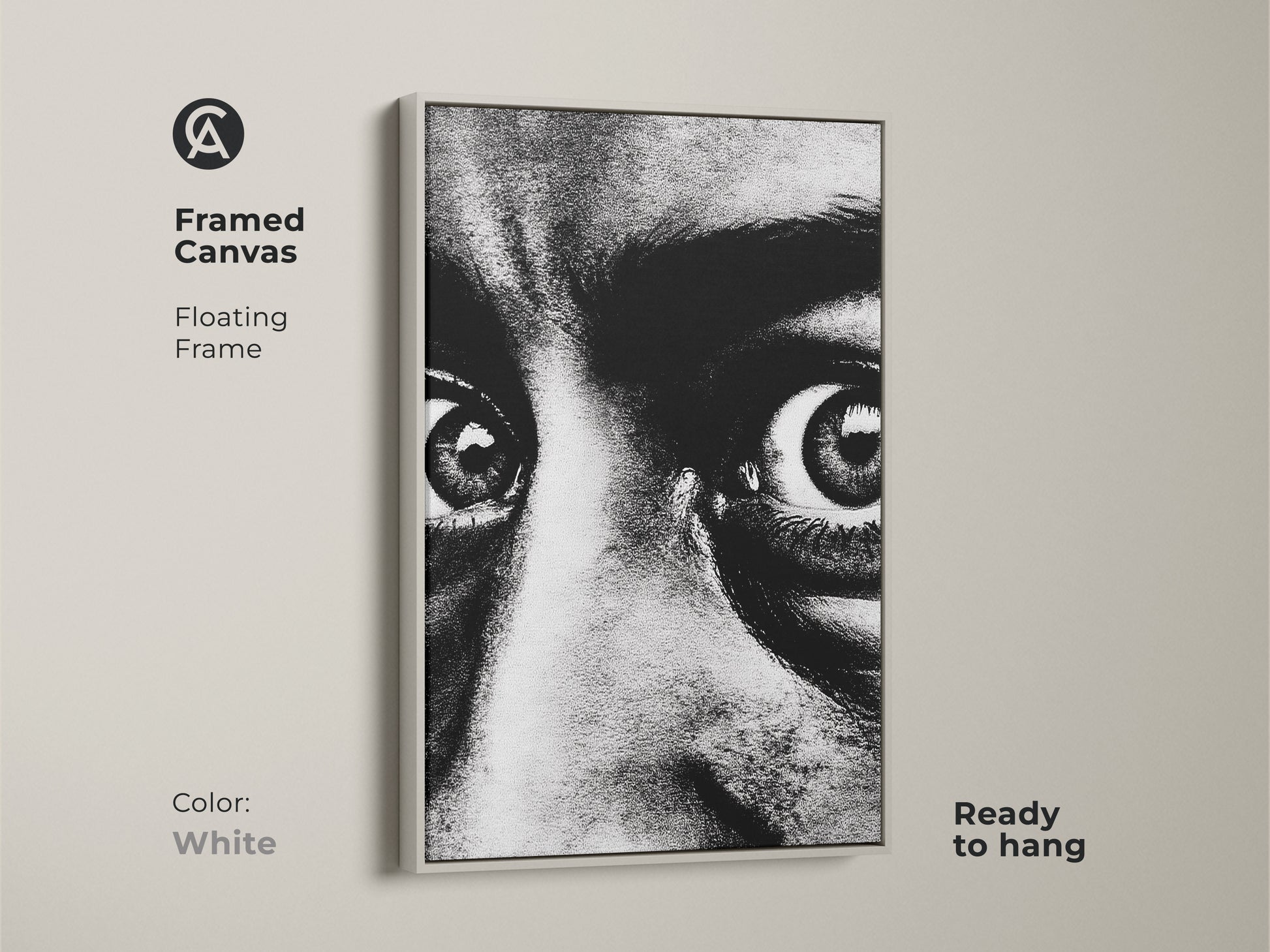Framed canvas of a monochrome face portrait with a white floating frame. Ready to hang this intense gaze canvas art adds a contemporary touch. The expressive eyes artwork is perfect for modern monochrome decor. Enhance your entryway with this bold black and white print.