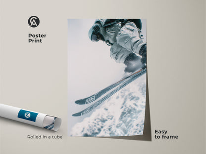 Poster print of a skier mid-jump. The artwork is rolled in a protective tube. This poster is easy to frame. Ideal for sports art collectors. Add action to your walls with this dynamic skier art.
