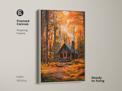 Framed canvas art showing a cabin in an autumn forest. The floating frame is white and ready to hang. This cabin artwork creates a clean modern look. Transform your space with framed fine art today.