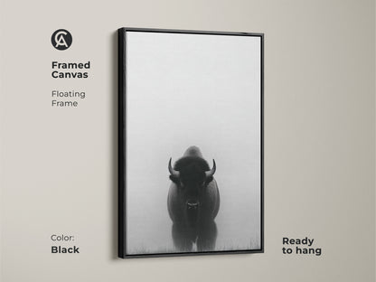 Framed in black this canvas features minimalist bison art. This black and white prairie canvas is ready to hang. The wildlife animal landscape print adds a rustic farmhouse touch.