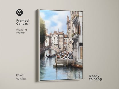 Framed canvas art in white featuring a Venice canal. The floating frame is ready to hang. This Italian architecture art showcases a traditional cityscape with a gondola boat. A perfect housewarming gift for travel lovers seeking classic Italian decor and elegant home decor.