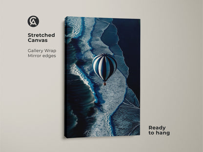 This stretched canvas artwork features a hot air balloon over dynamic ocean waves. The gallery wrap with mirror edges is ready to hang. Navy blue hues dominate this contemporary coastal decor offering an adventurous and modern travel art piece.