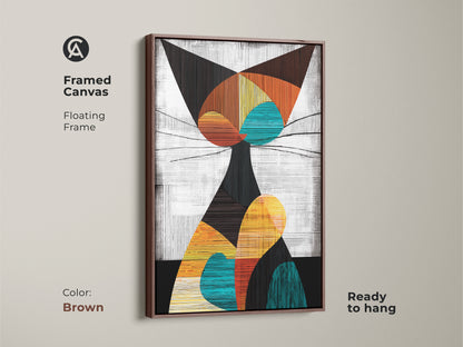 Framed canvas in a brown floating frame showcasing geometric cat art. This colorful cat art is a great housewarming gift. Enhance your eclectic home decor with this vintage style cat art.