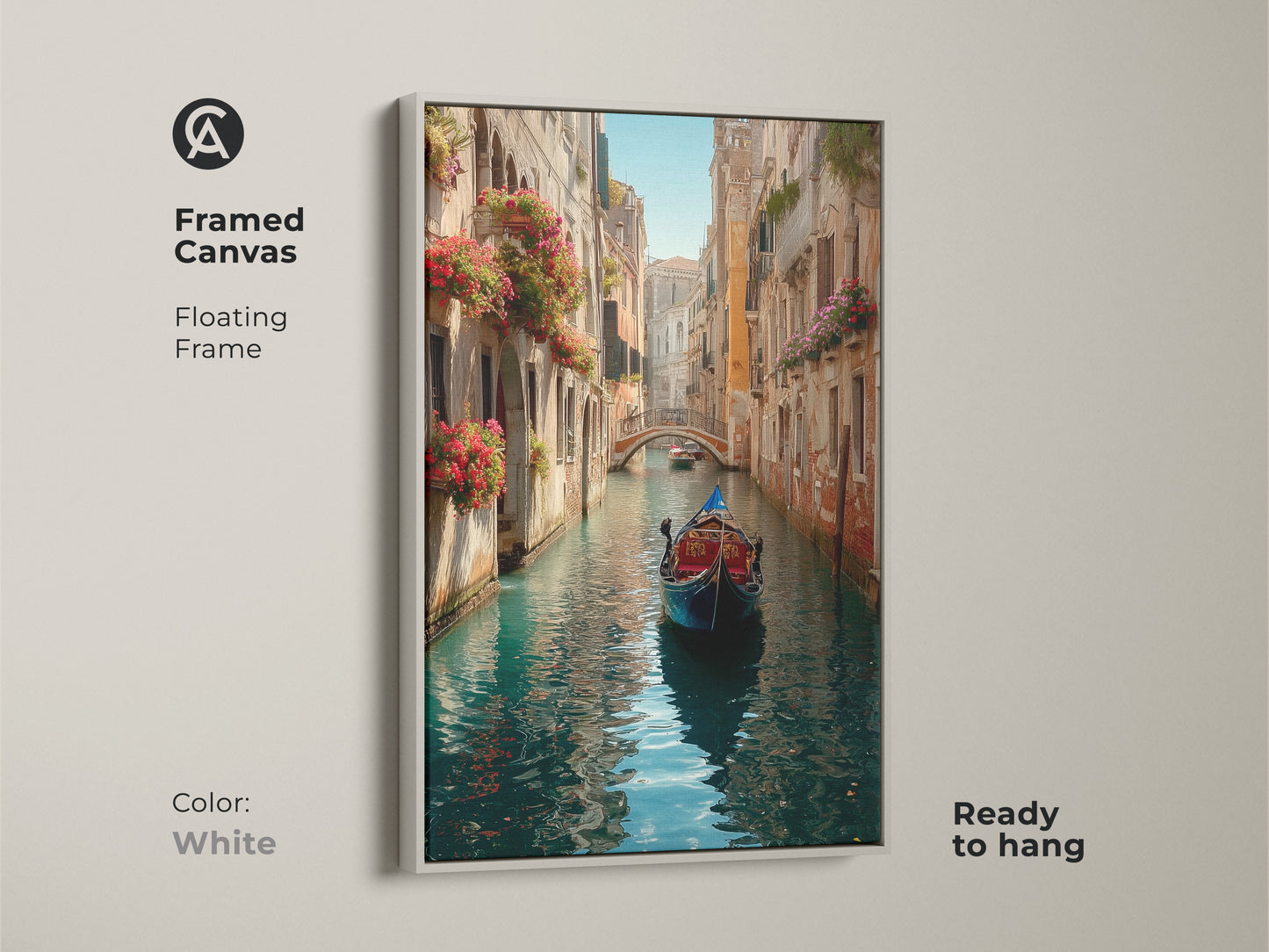 Brighten your home with this framed Venice canvas artwork. It shows a gondola on a canal with historic buildings. Red flowers fill the window boxes creating a vibrant scene. The white floating frame offers a clean look. This artwork is ready to hang.