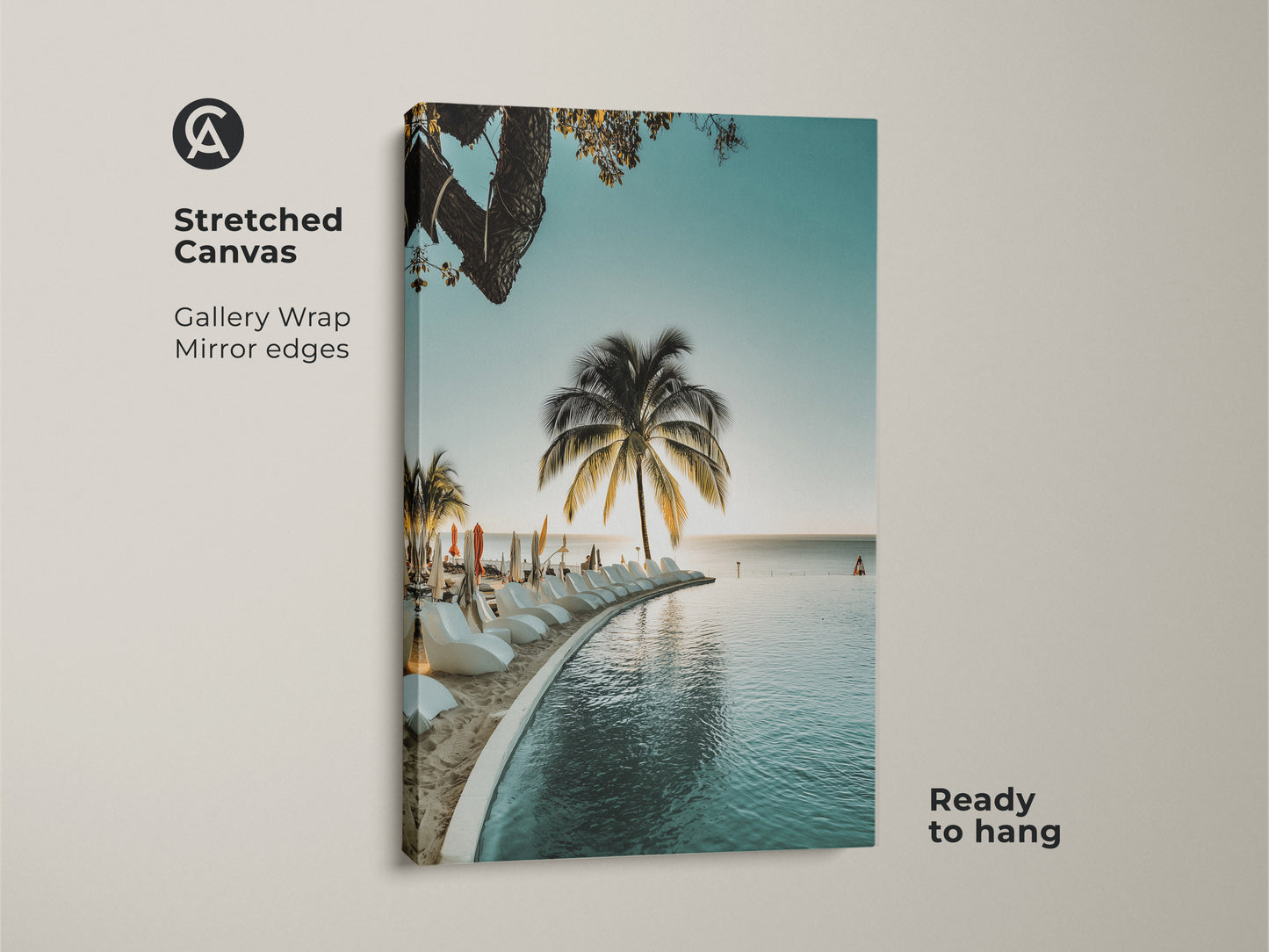 Stretched canvas coastal art print. The tropical beach wall art shows a palm tree ocean view and infinity pool. Enjoy relaxed summer vibes with this blue teal coastal decor. A perfect beach house wall hanging.