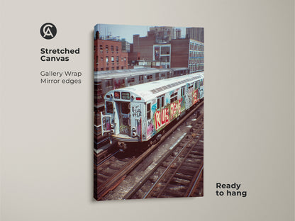 Stretched canvas print of a graffiti subway train. This urban street art is gallery-wrapped with mirrored edges. Ready to hang this industrial loft wall art brings a cityscape view. Perfect for hip hop fans.