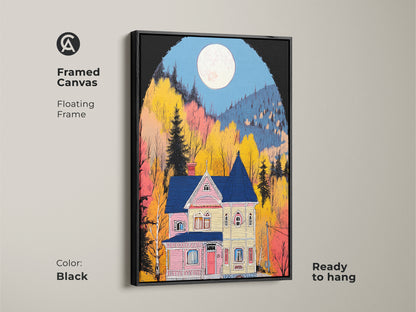 Framed canvas art displaying a Victorian house under a full moon. This folk art print features a floating black frame adding a sophisticated touch. Ready to hang this artwork creates a cozy eclectic home environment.