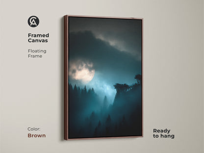 Brown framed canvas featuring a deep blue moonlit forest. This misty night landscape wall art enhances any room. The atmospheric forest scene brings nature indoors. Ideal bedroom decor with modern blue teal art. A thoughtful housewarming gift for nature lovers.