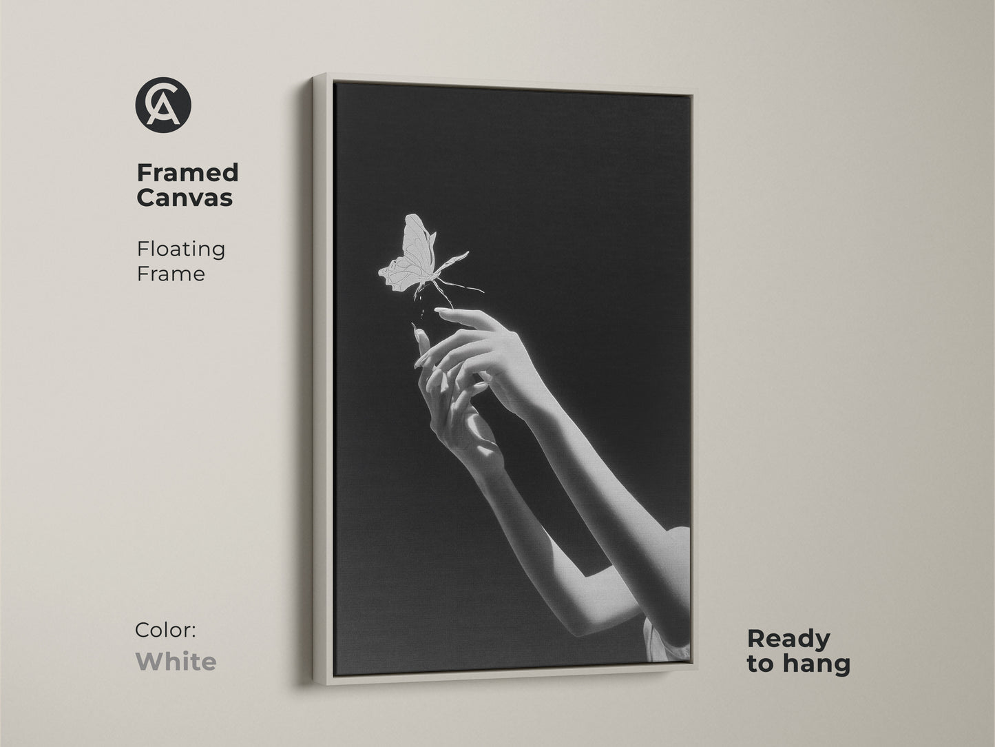 A framed canvas presents monochrome butterfly art with hands reaching. Ready to hang with a sleek white floating frame it's minimalist. This surrealist wall decor makes a symbolic statement in modern homes. It’s an artistic wall hanging perfect as bedroom art. Enjoy this contemporary art.