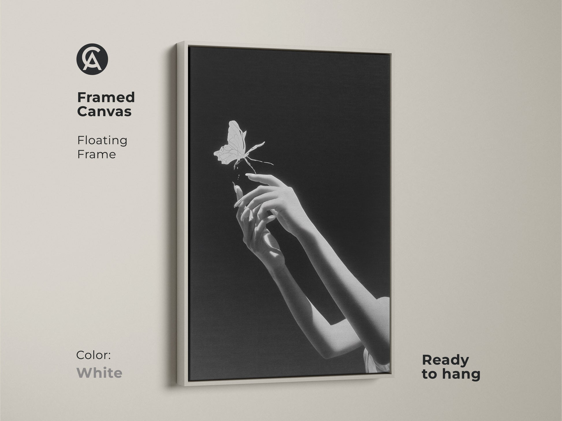 A framed canvas presents monochrome butterfly art with hands reaching. Ready to hang with a sleek white floating frame it's minimalist. This surrealist wall decor makes a symbolic statement in modern homes. It’s an artistic wall hanging perfect as bedroom art. Enjoy this contemporary art.