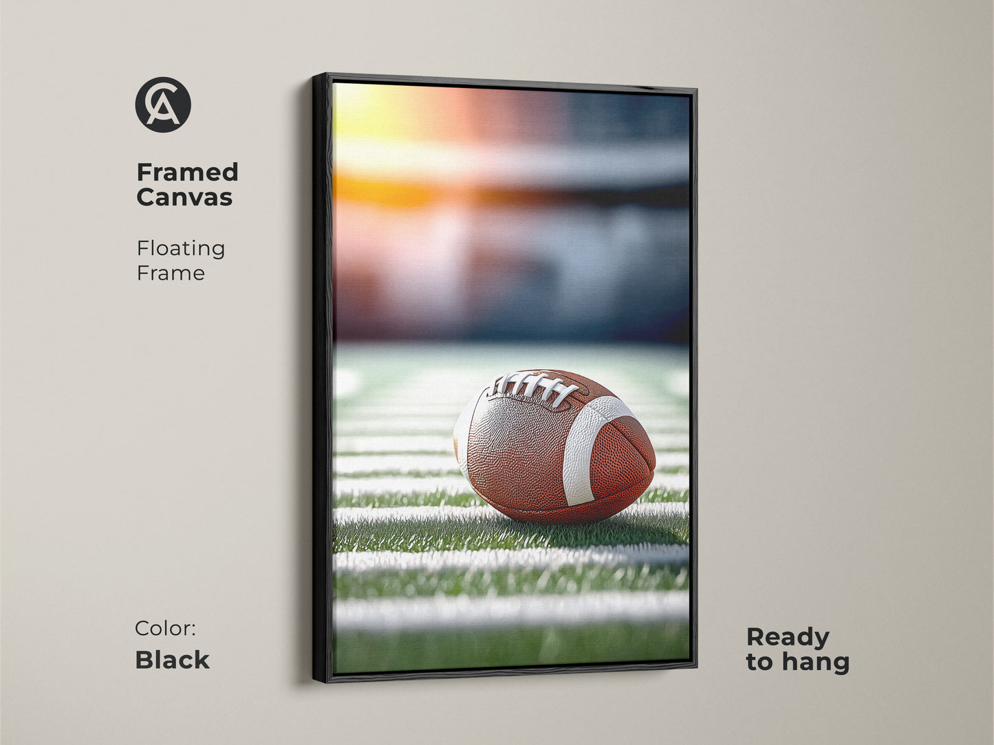 Framed canvas featuring a realistic football on a field. The floating frame is black. This game day football decor is ready to hang. It's perfect for sports fan wall decor. A great piece for a man cave sports art.