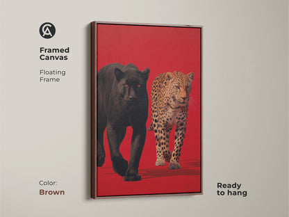 Framed canvas art of a black panther and leopard with a brown floating frame. This high-quality animal art print is ready to hang. Elevate your home decor with this unique wildlife art. Shop now for framed canvas prints