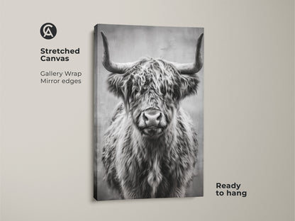 Stretched canvas featuring a black and white highland cow print. This photorealistic bull artwork with mirror edges is ready to hang adding farmhouse style to any space. Perfect rustic animal art.