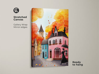 Stretched canvas art print of an autumn cityscape. The artwork features a woman with an umbrella and charming houses. Gallery wrapped with mirror edges this piece is ready to hang. The watercolor style and warm colors bring a cozy fall feel to any eclectic home. Add a touch of autumn charm to your walls.