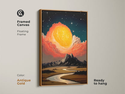 Framed canvas print of a cosmic sun rising over mountains and a river. The floating frame is antique gold. This expressive landscape wall art has yellow orange teal tones. A great housewarming gift for stargazers. Ready to hang.