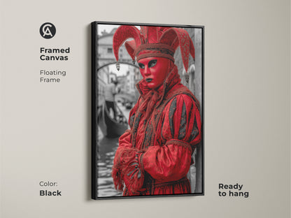 Framed canvas of a theatrical Venice carnival scene. This features a striking red Jester figure. Encased in a black floating frame this crimson mask artwork adds a touch of luxury to any room. Ready to hang and enjoy.
