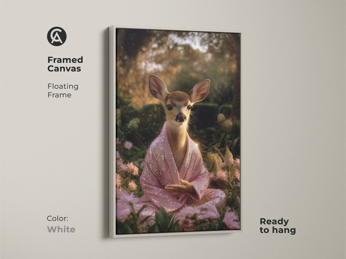 White framed canvas artwork of a meditating deer. The fawn wears a pink sequin robe. This spiritual animal wall decor is ready to hang. The boho zen art brings a peaceful vibe. It's perfect for bedroom spiritual decor.