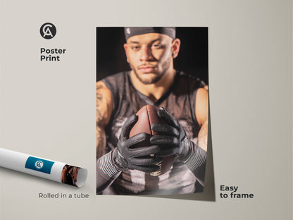 Rolled poster print of an American Football athlete portrait. Easy to frame and ready to display. This sports wall decor adds a dynamic feel to any office or home gym. The brown tan black canvas creates a masculine decor. Buy this gift for a football fan today.