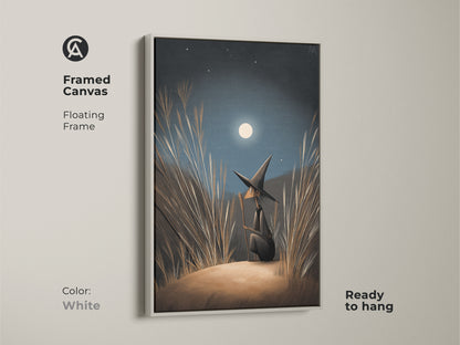 Framed Canvas of fantasy wall art ready to hang. A witch gazes at the moonlight. The Floating Frame is white. Navy Blue Gold Moonlight Canvas. Find boho bedroom decor here. Perfect Halloween Occasion Gift for witch lovers.