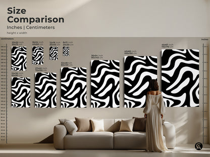 Size comparison of abstract zebra art prints. See how the canvas art fits above a sofa. Available in various sizes. Black and white art provides a modern touch to any living room.