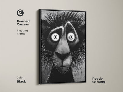Black framed canvas of a lion artwork ready to hang. This floating frame artwork features a stylized lion with an anxious expression. It will add character and charm to any room. This artwork is gallery ready.