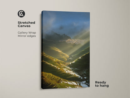 Stretched Canvas of Terrace Fields art showcases golden sunbeams illuminating a distant village. The blue green landscape provides travel-inspired decor. This photorealistic print is ready to hang.