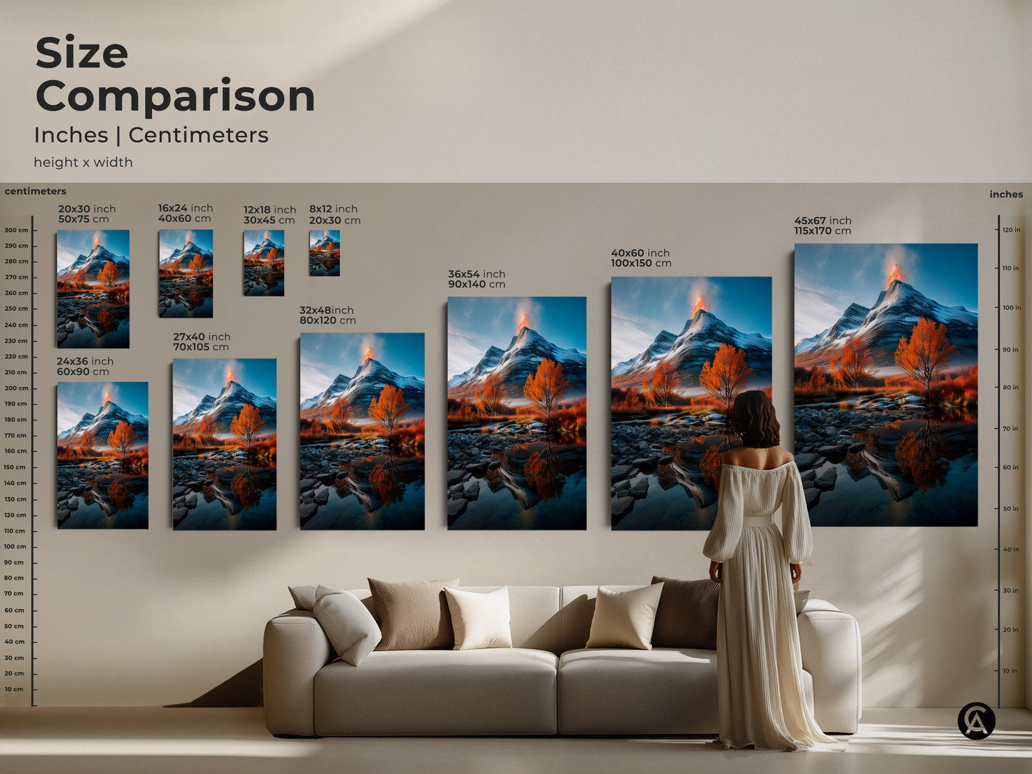 Size comparison of snowy volcano canvas art prints in inches and centimeters. A woman stands near the canvas art to show scale. The mountain landscape print is perfect for rustic home decor. It is a great nature lover gift idea that adds beauty to any living room.