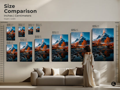 Size comparison of snowy volcano canvas art prints in inches and centimeters. A woman stands near the canvas art to show scale. The mountain landscape print is perfect for rustic home decor. It is a great nature lover gift idea that adds beauty to any living room.