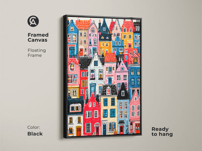 Framed canvas showing colorful houses art. It has a black floating frame. The artwork is ready to hang. This vibrant cityscape print is a stylish addition to any wall. Perfect wall decor.