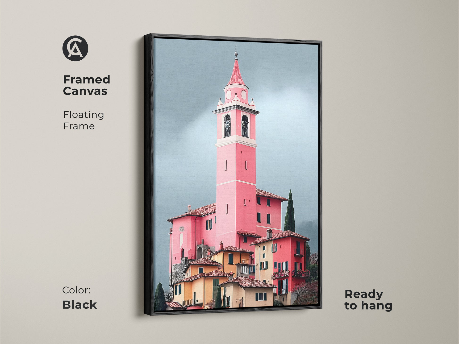 Framed canvas in black displaying a pink church tower art print. Floating frame highlights European village artwork. Italian architecture painting brings travel inspired decor.