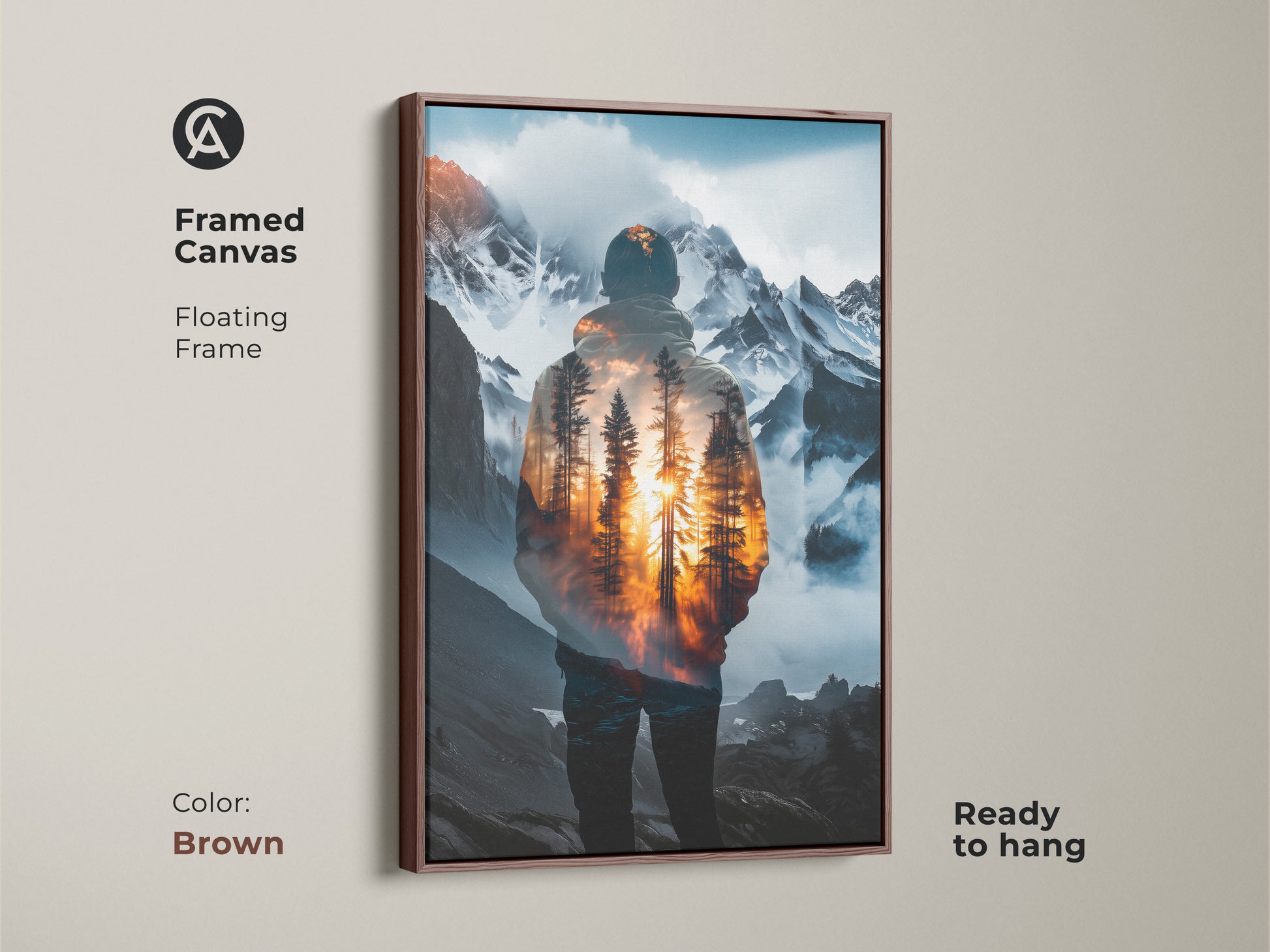 Framed canvas featuring a double exposure art. A man in a hoodie merges with a majestic mountain and forest landscape. This serene nature print is ready to hang with a brown frame. A thoughtful gift for him outdoors.
