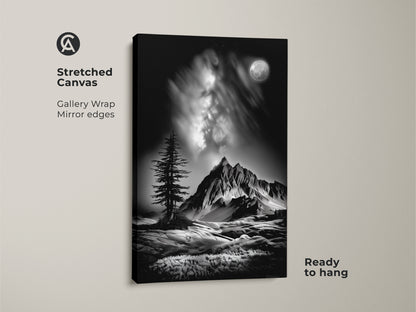 This is a monochrome mountain canvas print. It shows a black and white landscape with a moonlit pine tree. The contemporary nature artwork has gallery wrap mirror edges and is ready to hang.