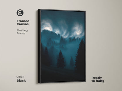 Framed canvas of a midnight blue forest art. The dark teal pine trees are set in a floating frame. This modern landscape artwork is ready to hang in a black frame.