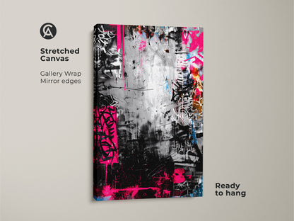Stretched canvas of abstract graffiti artwork ready to hang. Mirror edges create a gallery wrap. The art features a monochrome palette accented with splashes of vibrant pink. Perfect for adding urban style.