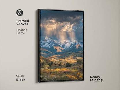 This framed canvas features a snowy mountain landscape. A black floating frame accentuates the art. It's ready to hang ideal for modern farmhouse decor. Perfect for nature lovers seeking elevated landscape art for their living room.