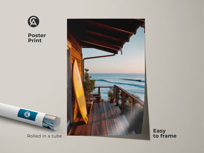 This poster print shows a surfboard on a porch overlooking the ocean. The coastal artwork is easy to frame and enjoy. Rolled in a tube for safe shipping. The surf art adds a touch of beach house style. Perfect for any surf lover's home decor.